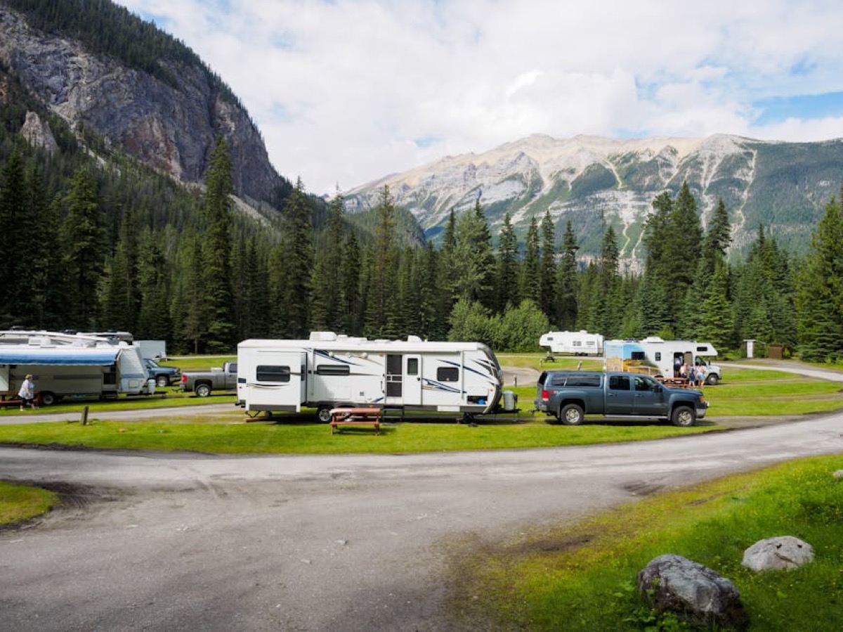 RVs parked at mountain campsite - recreational power needs for extended off-grid stays