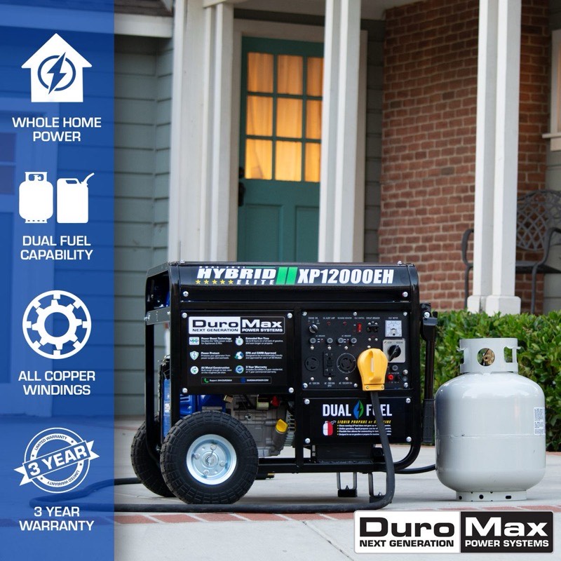 DuroMax XP12000EH dual fuel portable generator running in a residential driveway