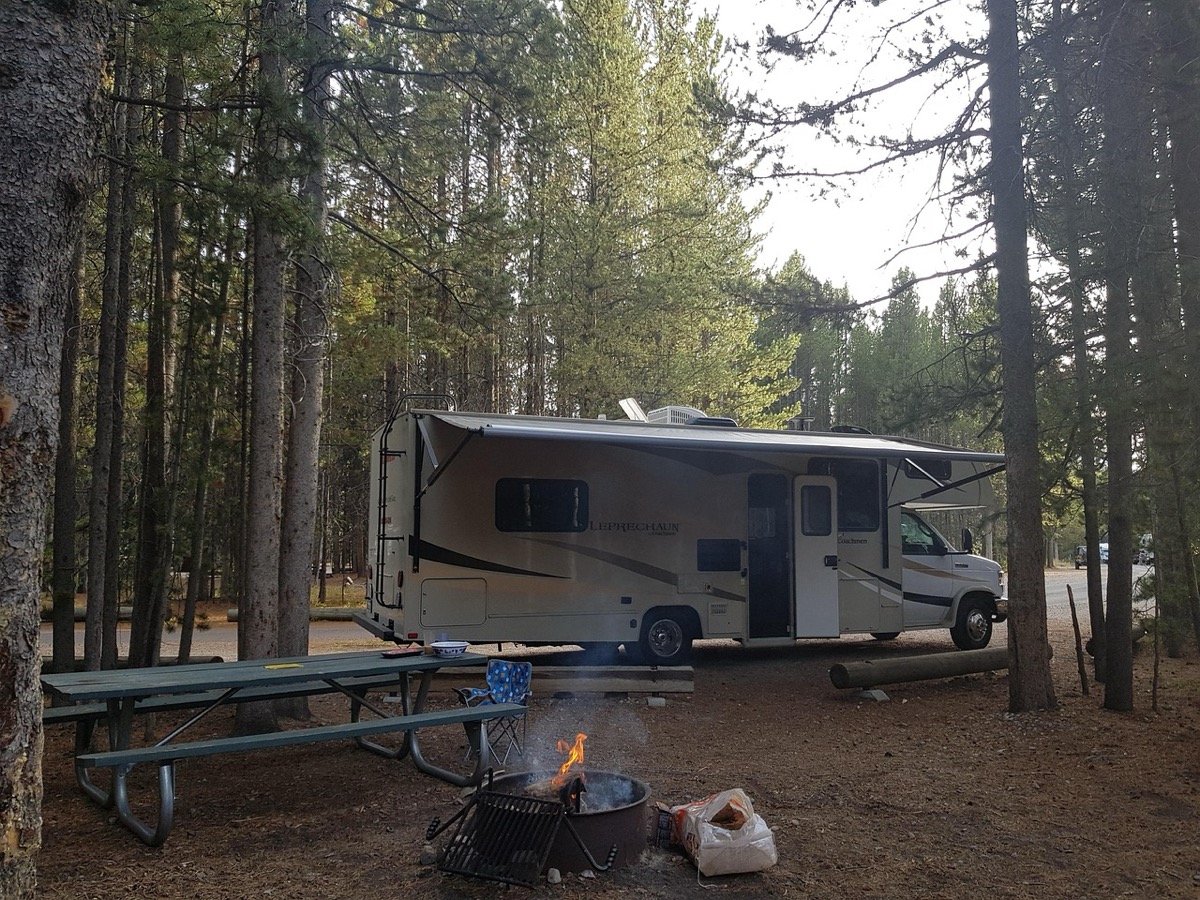 RV motorhome campground camping requiring portable generator power in remote mountain wilderness